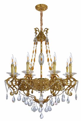Eight Arm Chandelier With Large Crystal Prisms And Intricate Brass Patterns