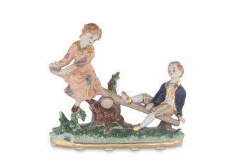 Boy And Girl Porcelain Figurine