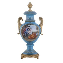 A Visual Feast: Striking Teal Urn With Ornate Rococo Design