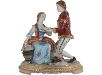 Rococo Romance: A Porcelain Figurine Of Love's Proposal