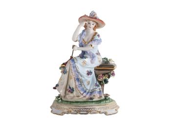 Classical Rococo Style Porcelain Lady Figurine In Blue And Yellow Dress