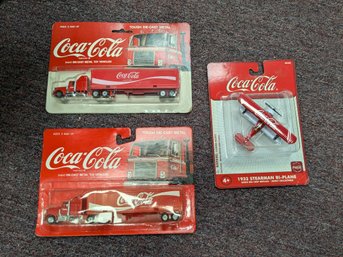 Lot Of 2 Coca Cola Tractor Trailers And A Coca Cola Air Plane