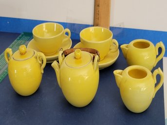 Yellow Miniature Porcelain Tea Pot, 2 Cups And Saucers And 2 Creamers.  Antique Nice Set