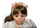 Vintage Porcelain Head Arms And Legs Doll With Purple Eyes 24 Inches Tall