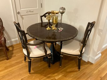 3D Round Table With Three Black Paint And Gilt Chairs With Decorative Table Top Items