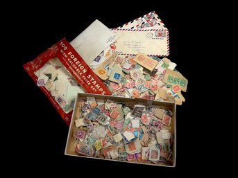 Two Boxes Of 1930s And Later Random American And World Stamps
