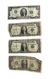 1935 E One Dollar Silver  Certificates And A 1976 Two Dollar Bill Plus A 1985 Dollar Bill