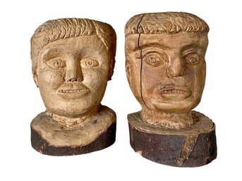 Pair Of Folk Art Heads Carved Out Of Wooden Trunks