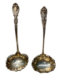 Two Sterling Silver Soup Ladles With Elaborate Designs