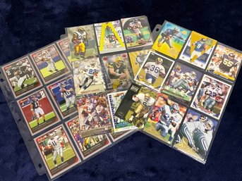 3 Pages Of Mixed Football Cards Including Derrick Henry Optic Silver Prizm