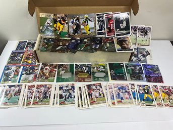 Box Of Football Cards With Some Inserts And Numbered Cards