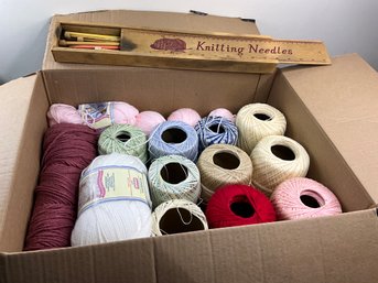 Box Of Yarn And Knitting Needles
