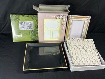 Group Of Picture Frames And Photo Albums