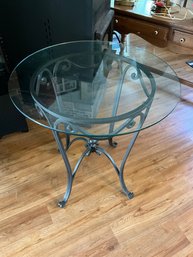 Wrought Iron Bistro Style Table With Round Glass Top