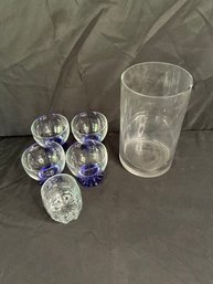 Group Of Glasses And A Large Vase