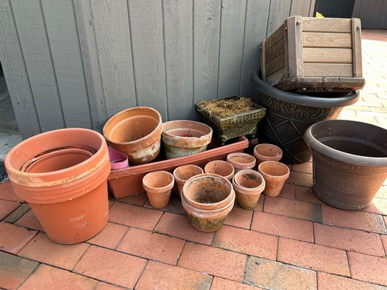 Large Collection Of Mixed Terracotta, Wood, And Plastic Pots And Planters
