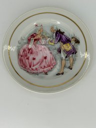 Portuguese Courting Couple Gilt Demitasse Saucer