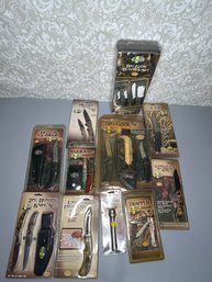 New Old Stock Lot Of 11 Mossberg Hunting Knives, Flashlight, And Butcher Sets