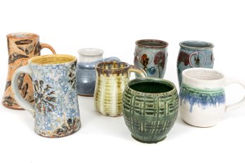 Collection Of Hand-Spun Glazed Pottery Mugs And Cups