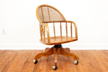 Vintage Cane Back Rolling Bankers Chair