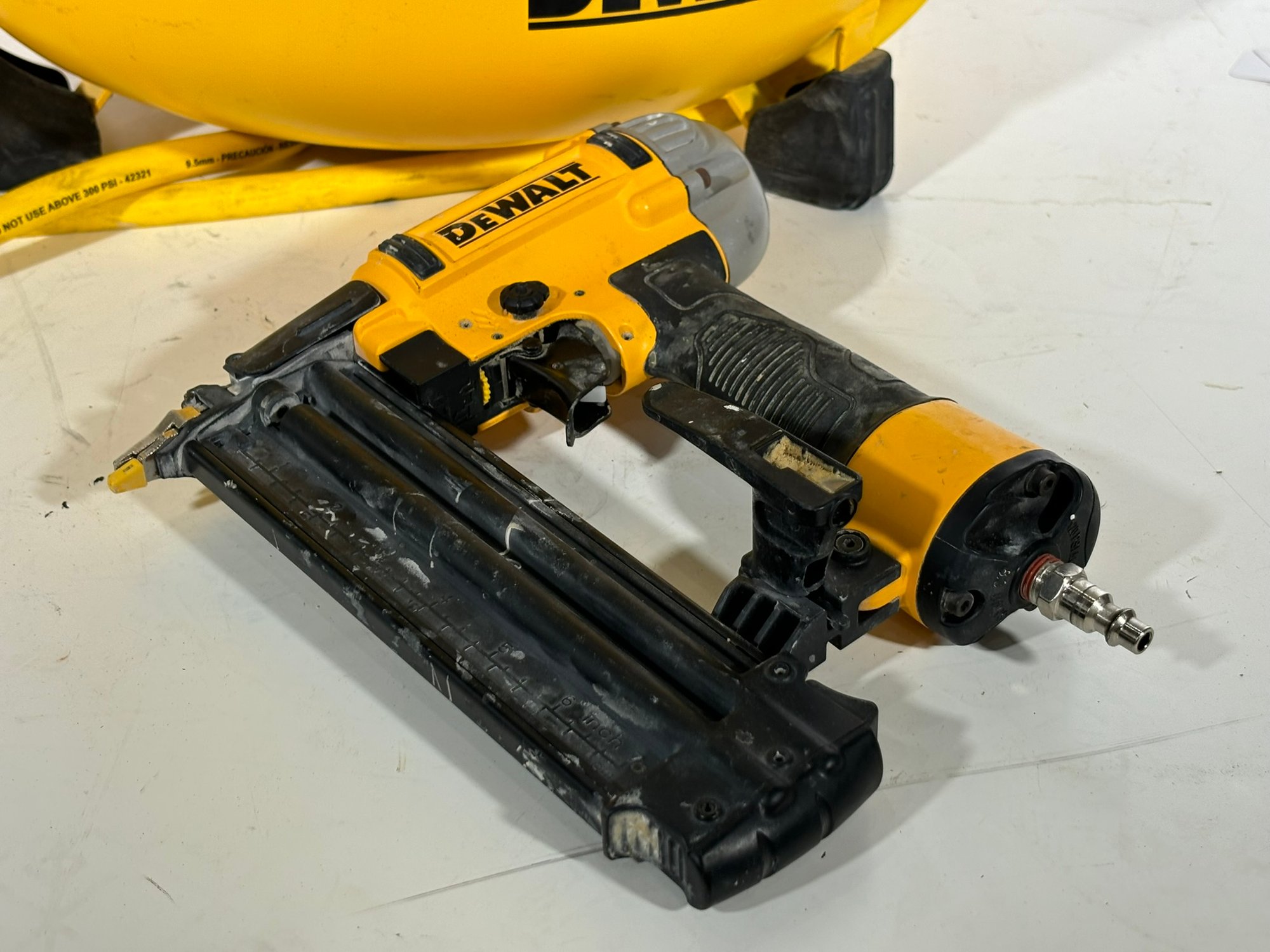 A Dewalt Nail Gun And Compressor 40790276