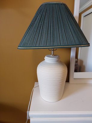 TEXTURED CREAM COLORED LAMP WITH GREEN PLEATED SHADE