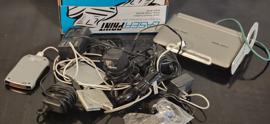 Box Of Electronics And Power Cords