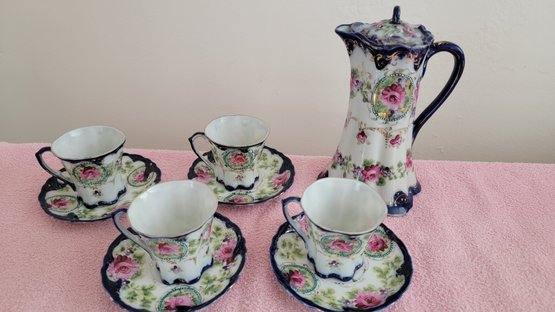 Porcelain Tea Service - 9 Pieces