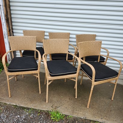 Set Of Six Wicker Chairs With Black Cushions