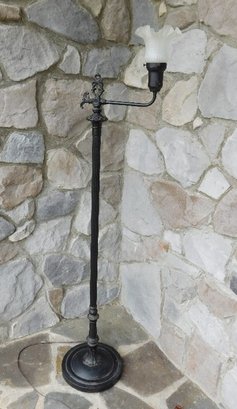 A Black Finished Floor Lamp With Frosted Upturned Shade