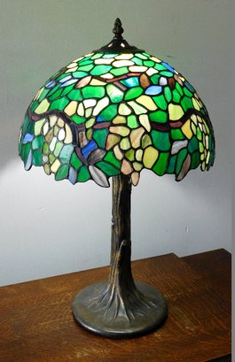 A Blue & Green Tiffany Style Tree Trunk Stained Glass Table Lamp