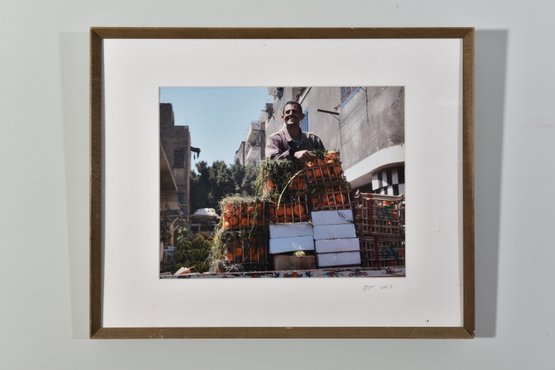 Signed Photograph Dated 2008 Depicting A Man With Crates Of Oranges