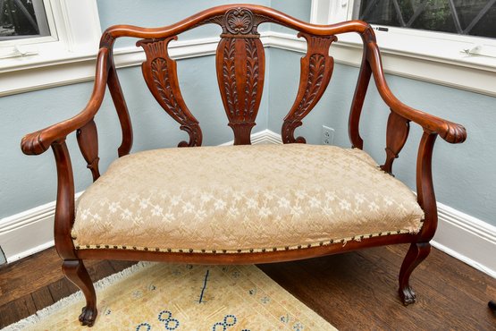 Antique Upholstered Carved Wood Settee With Nailhead Trim And Front Paw Feet