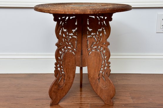 Ornate Anglo-Indian Carved Wood Table With Inlay Detail And Butterfly Folding Legs