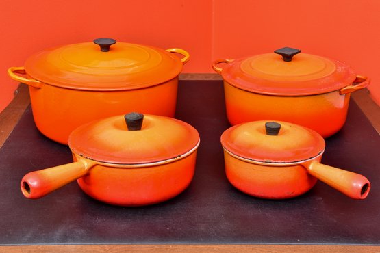 Set Of Four Vintage Le Creuset Flame Enameled Cast Iron Dutch Ovens And Sauce Pots