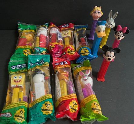 PEZ Lot: 9 NIP Characters: Sponge Bob, Santas, Lucy,Snowman 4 Standing Figures Made In Hungary