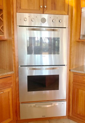 A Viking Stainless Steel Double Oven And Warming Drawer