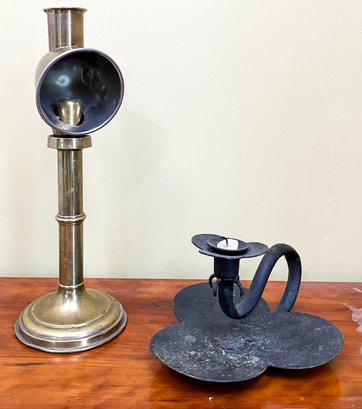 An Antique Brass Student Lamp And Japanese Bronze Candle Holder