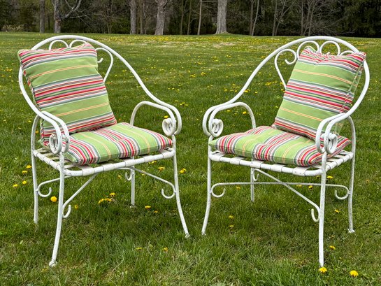 A Pair Of Vintage Wrought Iron Armchairs With Pottery Barn Cushions And Accent Pillows