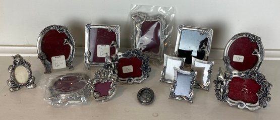 Fourteen Pewter Miniature Frames