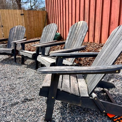 A Collection Of 4 Foldable Wood Adirondack Chairs