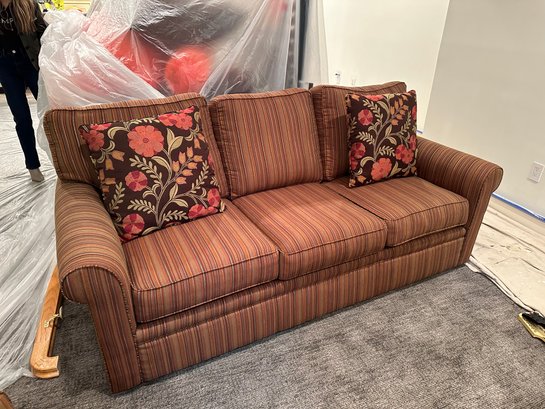 Orange And Brown Upholstered Couch