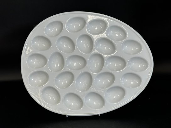 A Classic Deviled Egg Platter In White Ceramic