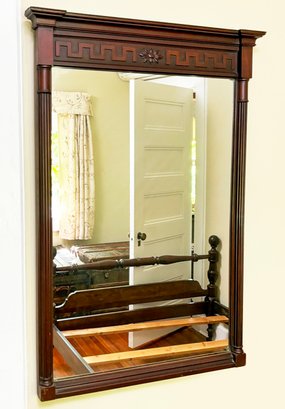 An Antique Carved Mahogany Mirror