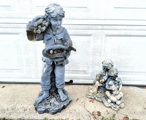 Two Garden Statues Featuring Children And Animals