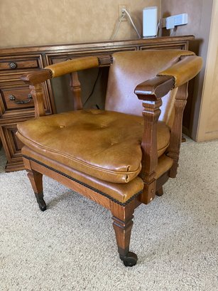 Vintage Leather And Wood Rolling Office Chair.