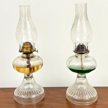 A Pair Of Vintage Hurricane Lamps