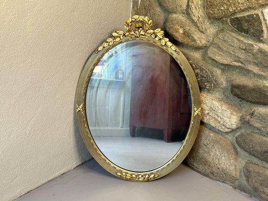A Gorgeous Vintage Mirror With A Decorative Gilt Frame