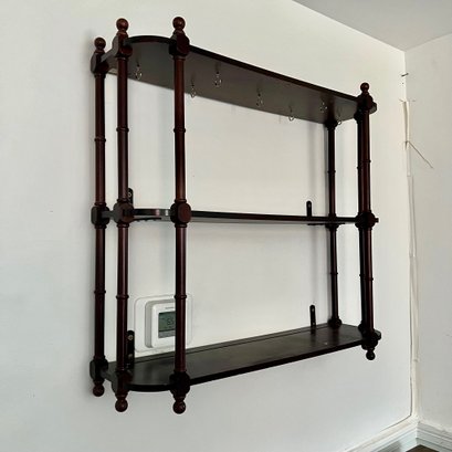 A Regency Style Bombay And Company Wall Hanging Curio Shelf