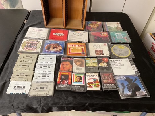 Lot Of CDS AND Cassettes With CD Holder